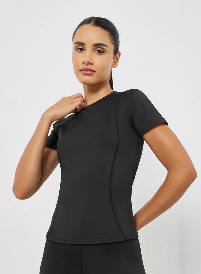 ستايلي اكتيف طقم بلوزة بأكمام قصيرة وتفاصيل خياطة مع ليقنز