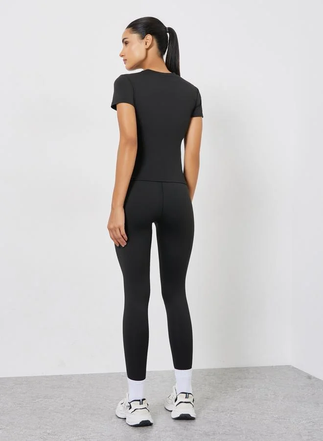 Styli Active  Stitch Detail Short Sleeves Top And Leggings Set for Women | Best Price UAE