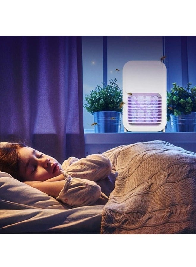 2 in 1 mosquito swatter with UV light. Can be placed on a stand or handheld. Charged via USB cable. - Image 3