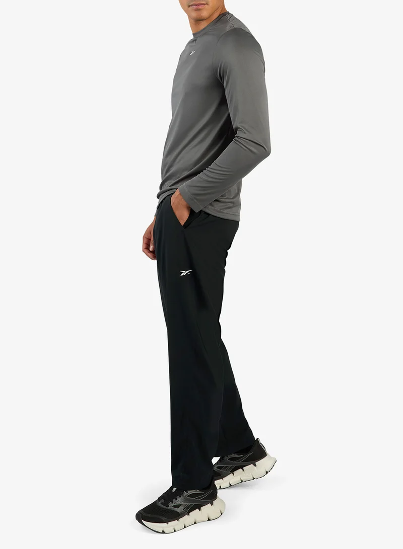 Reebok  Identity Train Woven Unlined Sweatpants for Men | Best Price UAE