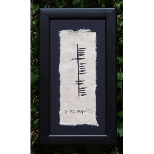 Biddy Murphy SONAS is Gaelic for Happiness, Hand Scripted Irish Ogham Wall Décor, 6”x 11”, Black Wood Matted Glass Frame, Elegant Bespoke Feathered Handmade Paper, Irish Housewarming Gift, Imported from Ireland | Handmade in Ireland | Crafted on Handmade Paper | Written in Ogham Script - Image 2