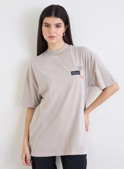Styli Styli Beige Washed Oversized T-Shirt with Badge Detail