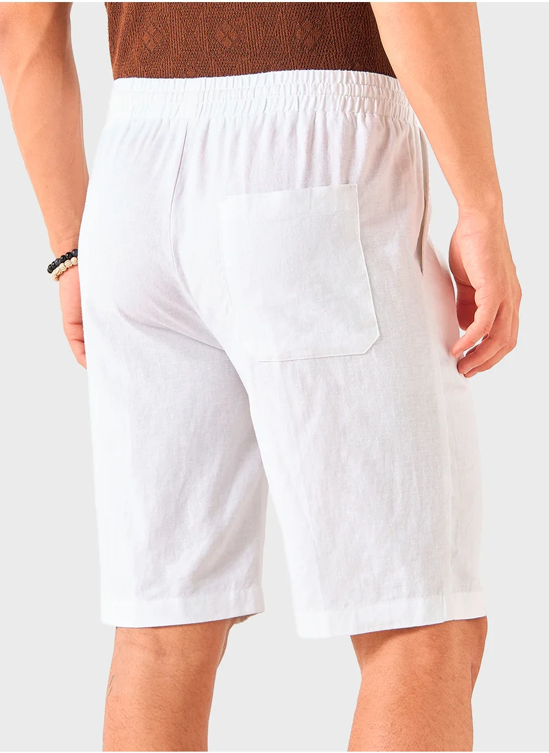 ايكونيك Iconic Solid Linen Blend Shorts with Pockets