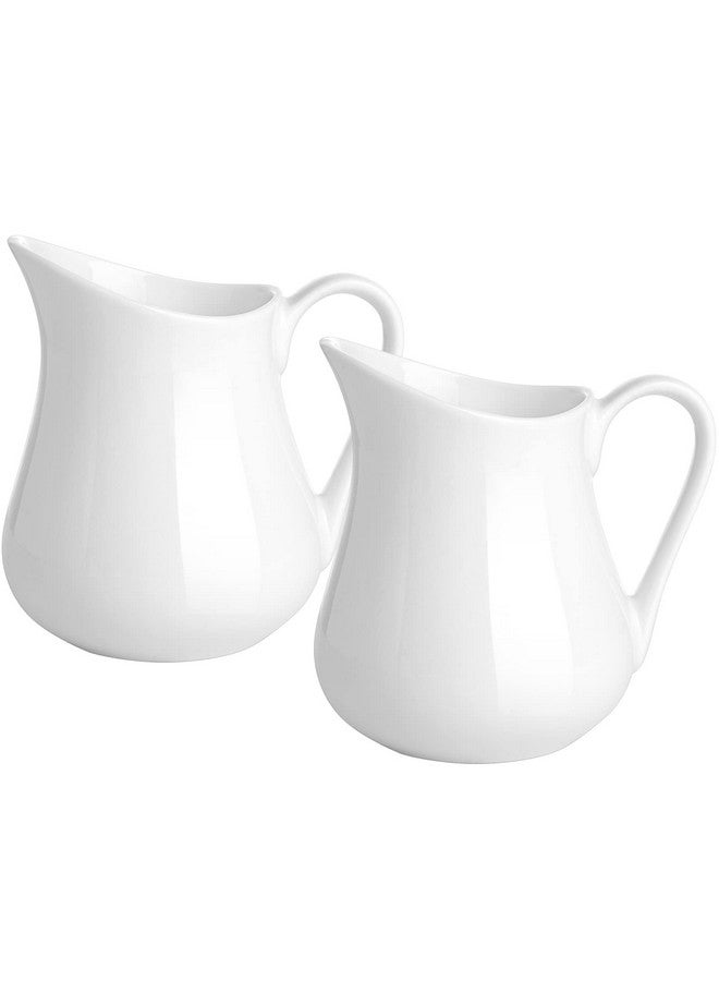 Gurygo عبوة من قطعتين من إبريق الكريمة الصغير الكلاسيكي المصنوع من السيراميك الأبيض سعة 4 أونصات مع مقبض - إبريق حليب صغير من البورسلين الفاخر - وعاء كريمة سيراميك للقهوة والحليب والصلصات والسلطة والميكروويف والفريزر - Image 1