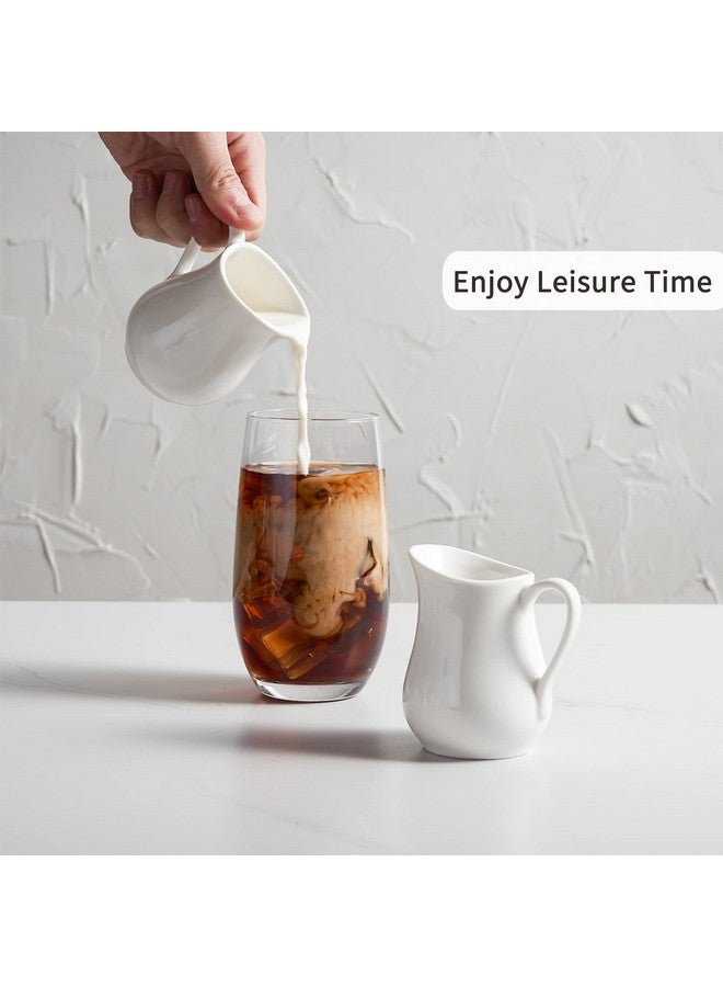 Gurygo عبوة من قطعتين من إبريق الكريمة الصغير الكلاسيكي المصنوع من السيراميك الأبيض سعة 4 أونصات مع مقبض - إبريق حليب صغير من البورسلين الفاخر - وعاء كريمة سيراميك للقهوة والحليب والصلصات والسلطة والميكروويف والفريزر - Image 3
