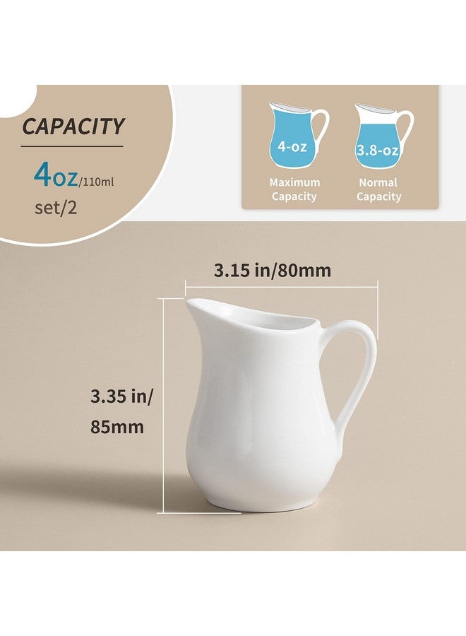 Gurygo عبوة من قطعتين من إبريق الكريمة الصغير الكلاسيكي المصنوع من السيراميك الأبيض سعة 4 أونصات مع مقبض - إبريق حليب صغير من البورسلين الفاخر - وعاء كريمة سيراميك للقهوة والحليب والصلصات والسلطة والميكروويف والفريزر - Image 2