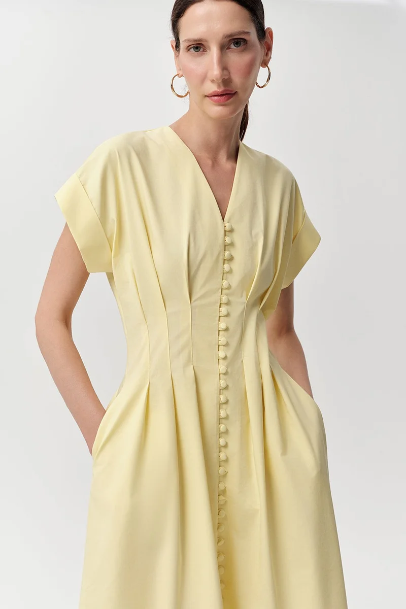 اكسيكيوز فستان ميدي أصفر بأكمام قصيرة وفتحة رقبة على شكل حرف V وأزرار