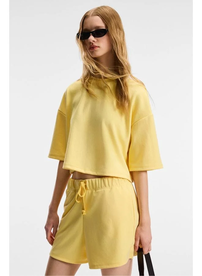 Ethiquet VELA Women's Stretch Fabric Bike Neck Oversized Fit Yellow T-Shirt.