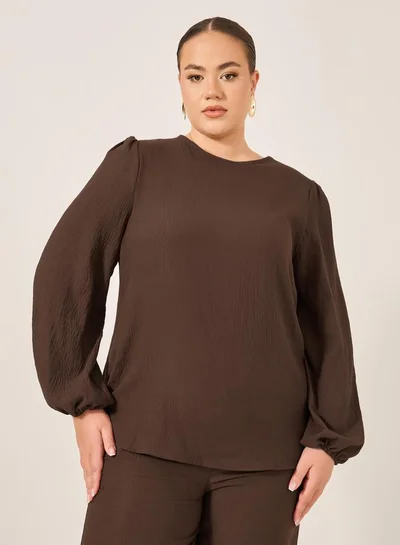 ستايلي بلوزة بأكمام طويلة سادة بمقاس كبير