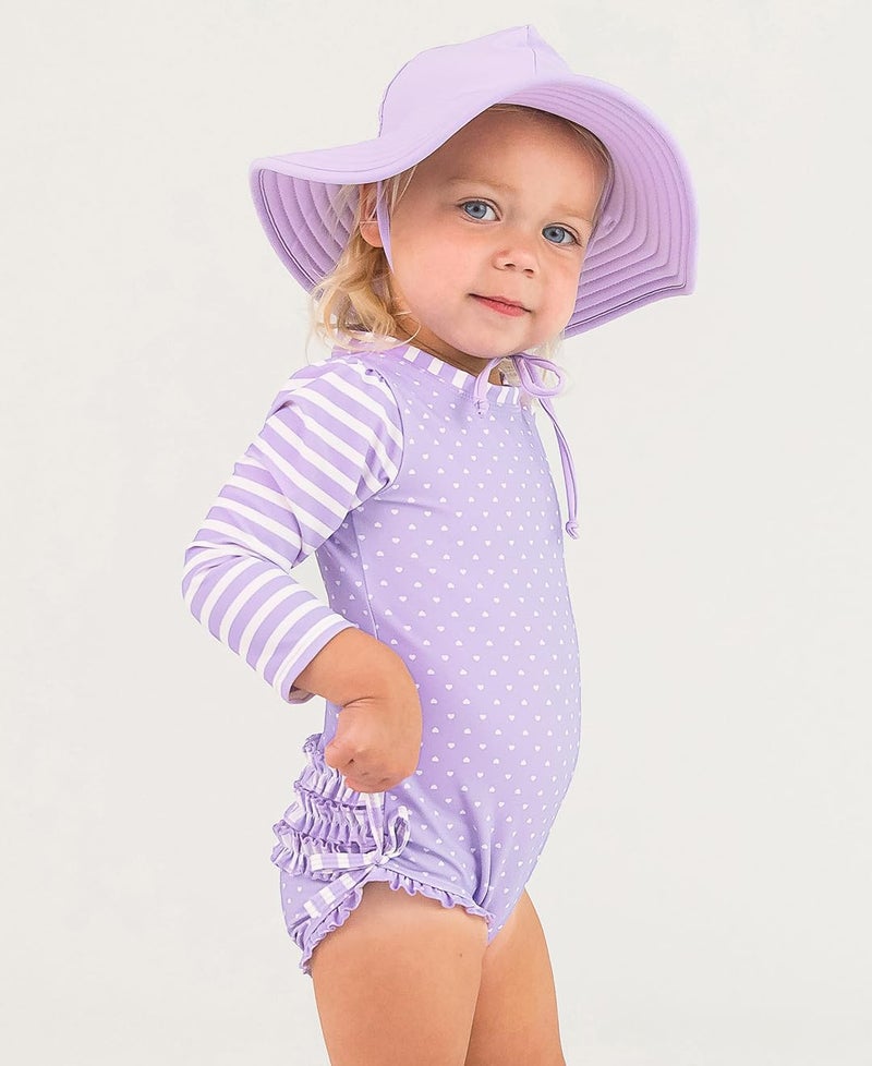 RuffleButts Baby Girls UPF 50+ Sun Protection Polka Dot Long Sleeve One Piece Rash Guard Swimsuit with Zipper - Lavender Heart Polka, 6-12m - Image 2