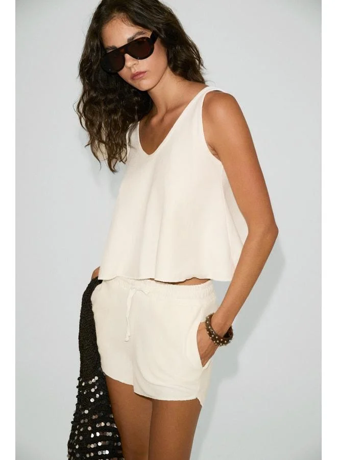 Ethiquet  PETUNYAL Women's V-Neck Tank Top and Cord-Pocket Short Shorts in Ecru Top-and-Bottom Set. for Women | Best Price UAE