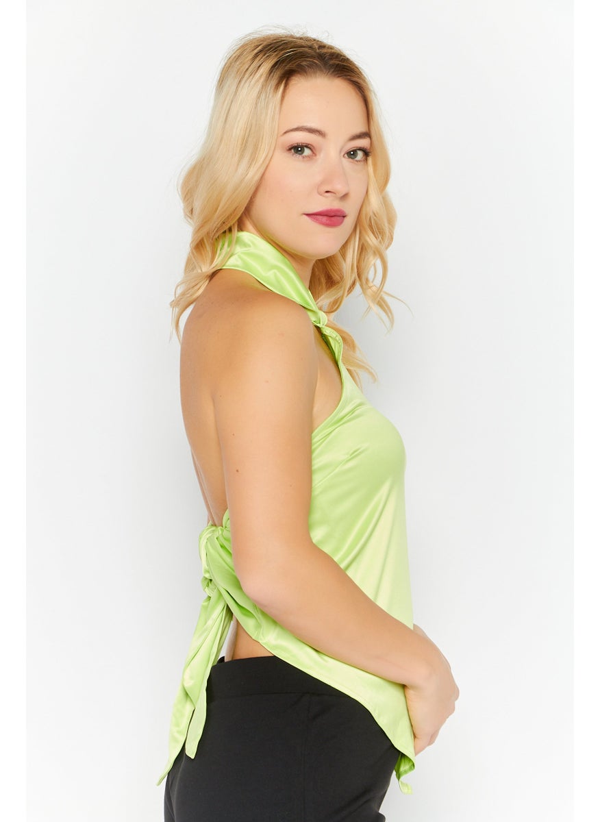 Women Halter Neck Sleeveless Solid Top, Green - pzsku/Z751109D966263C0D5453Z/45/_/1727187569/de2bb547-fda9-499e-9b4b-f5d94c8e3ee3