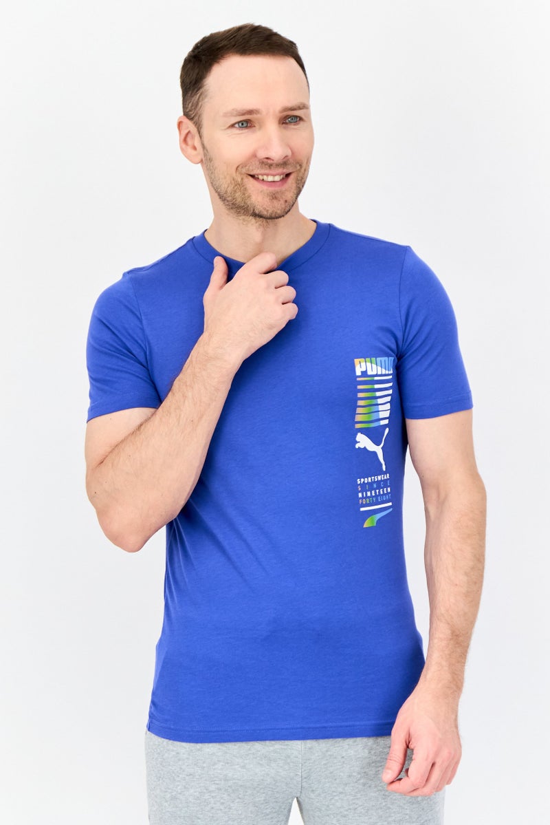 PUMA Men Sportswear Fit Short Sleeves Outdoor T-Shirt, Blue - Image 1