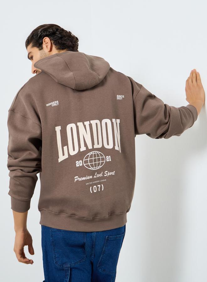 ستايلي هودي واسع من الفليس بطبعة خلفية - Image 1