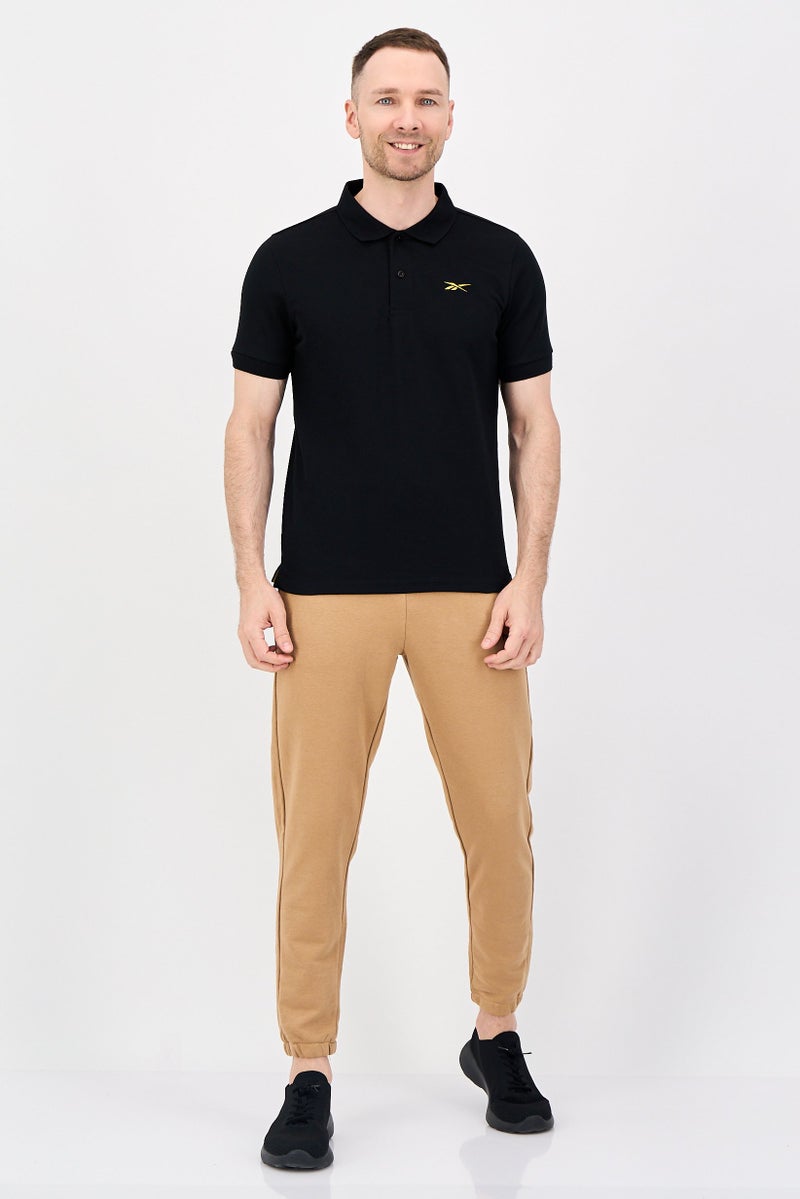 Reebok Men Sportswear Fit Short Sleeve Outdoor Polo Shirt, Black - Image 4