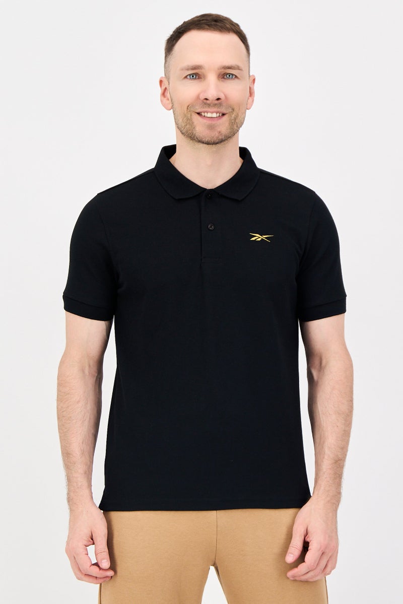 Reebok Men Sportswear Fit Short Sleeve Outdoor Polo Shirt, Black - Image 1