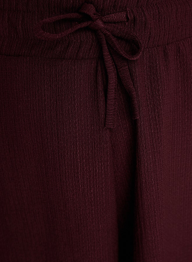 trendyol Claret Red Relaxed Cut Regular Waist Crepe/Textured Knit Shorts  - Image 5