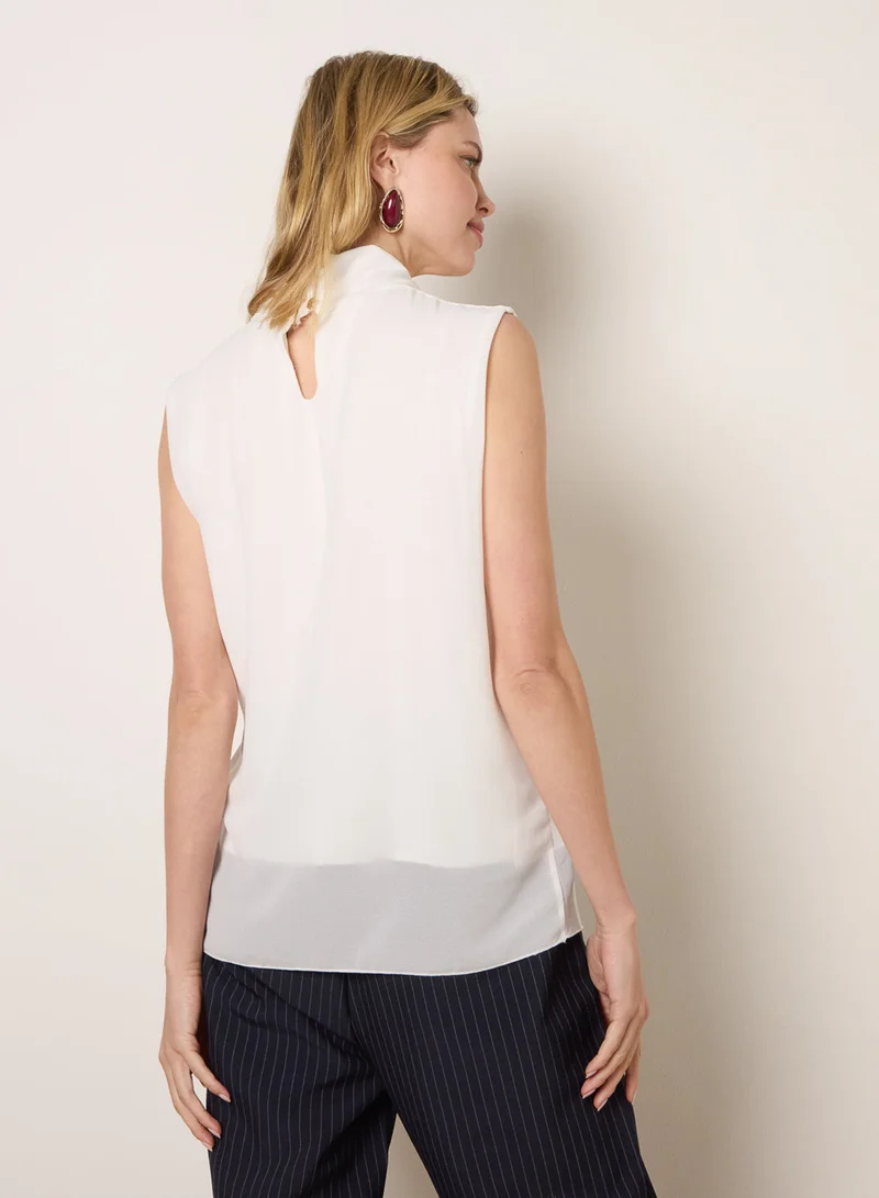 بلو فانيلا Sleeveless Cowl Tie Front Chiffon Blouse