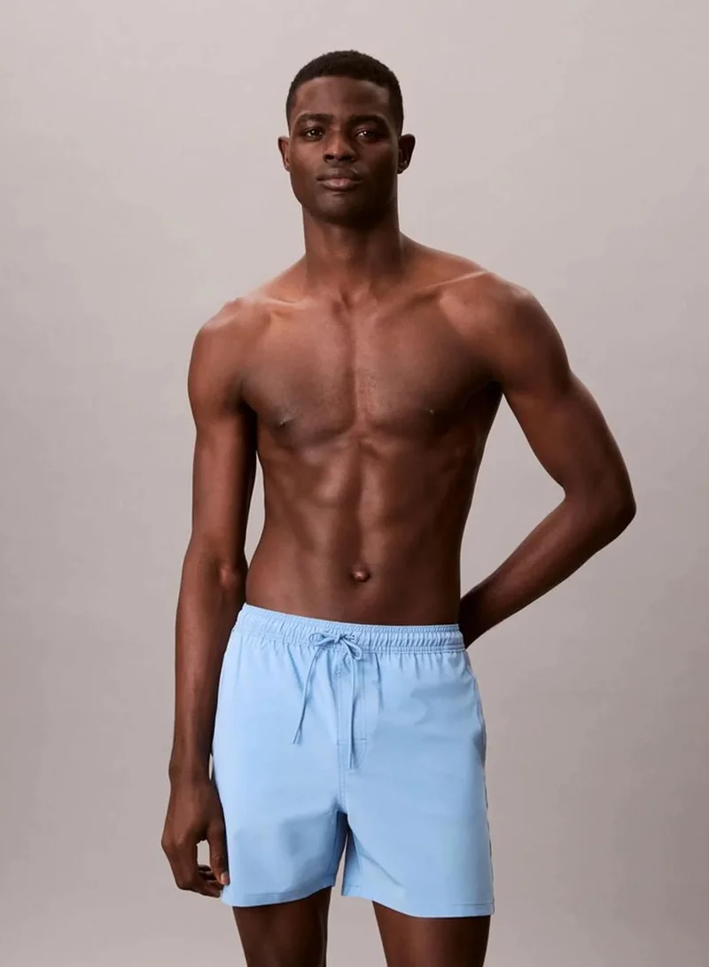 Calvin Klein Gulf Blue Core Solid Swim Shorts for Men | Best Price UAE