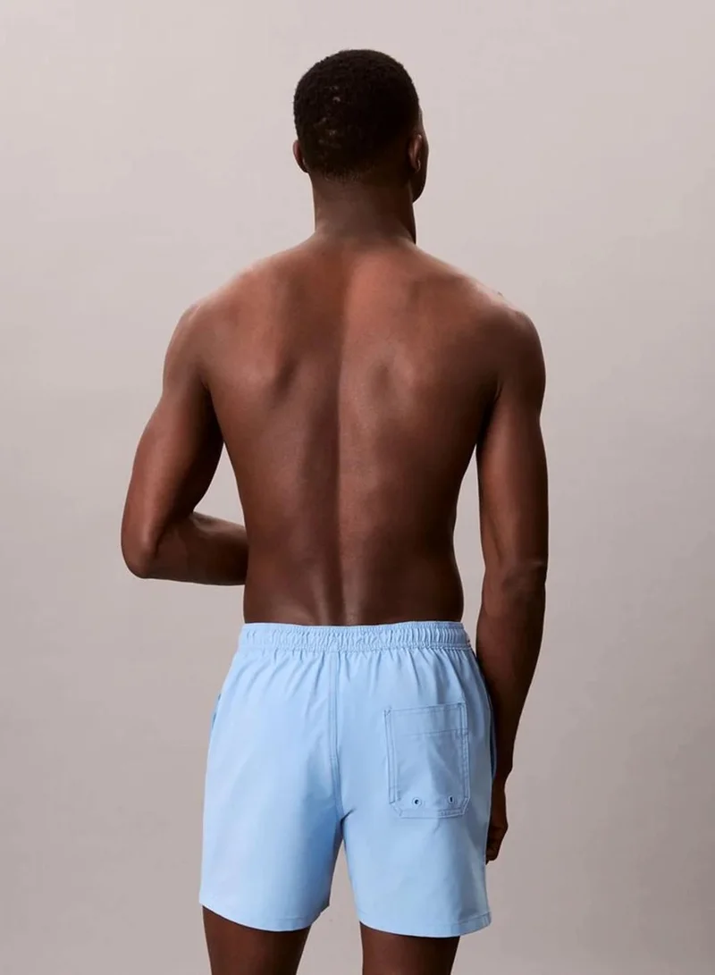 Calvin Klein Gulf Blue Core Solid Swim Shorts for Men | Best Price UAE