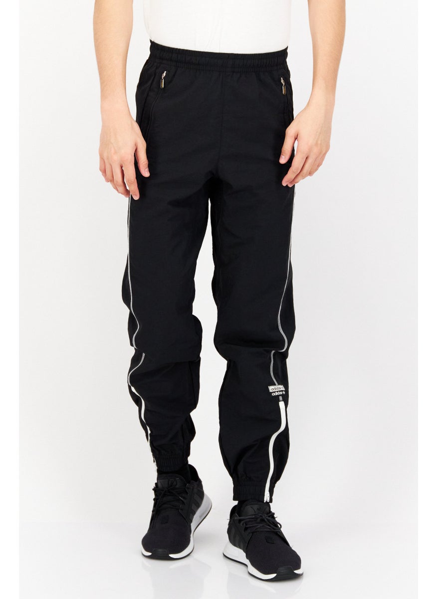 Men Sportswear Fit Brand Logo Outdoor Trackpants, Black - pzsku/Z7545ABB693C2535DC047Z/45/_/1737641762/1e8cb70d-eb6c-48ce-9d8b-5ba246f98694