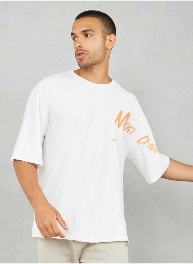 ستايلي Placement Slogan Print Oversized Streetwear T-Shirt