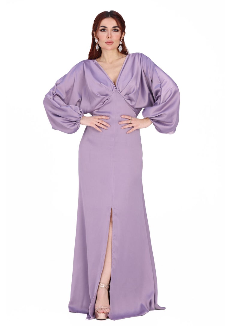 Modern Design A classic soft evening dress with a high bodice, long wide sleeves and an elegant slit from the knee  - Image 1