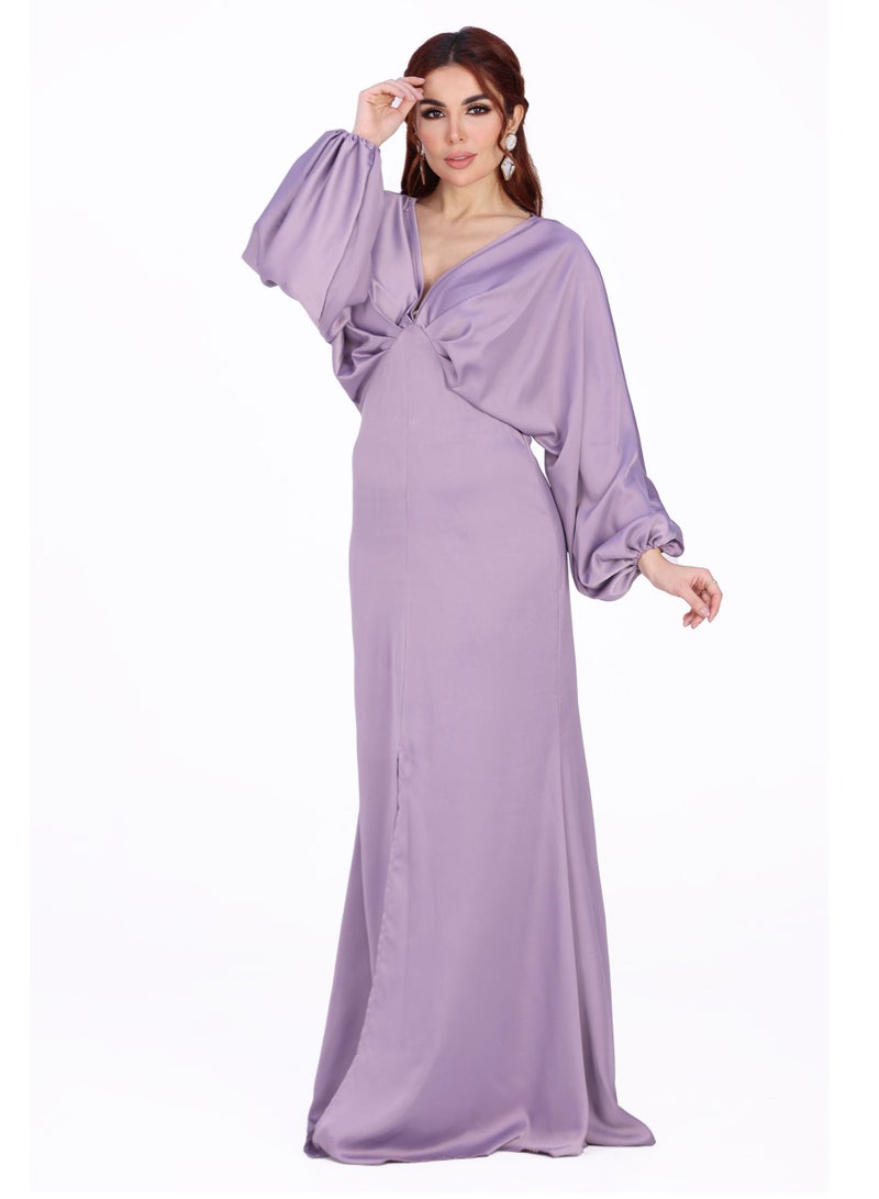 Modern Design A classic soft evening dress with a high bodice, long wide sleeves and an elegant slit from the knee  - Image 2