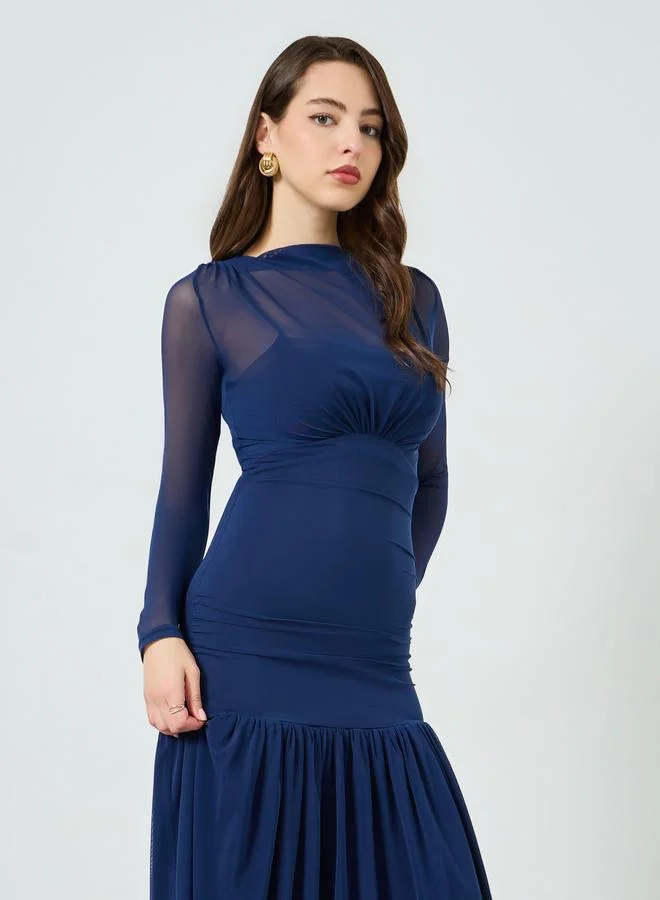 ستايلي فستان طويل بحافة واسعة وأكمام طويلة