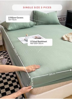 LUNA Home 3-Piece Set: single-size fitted bedsheet and two pillowcases, washable cotton in a light green color.  - Image 2