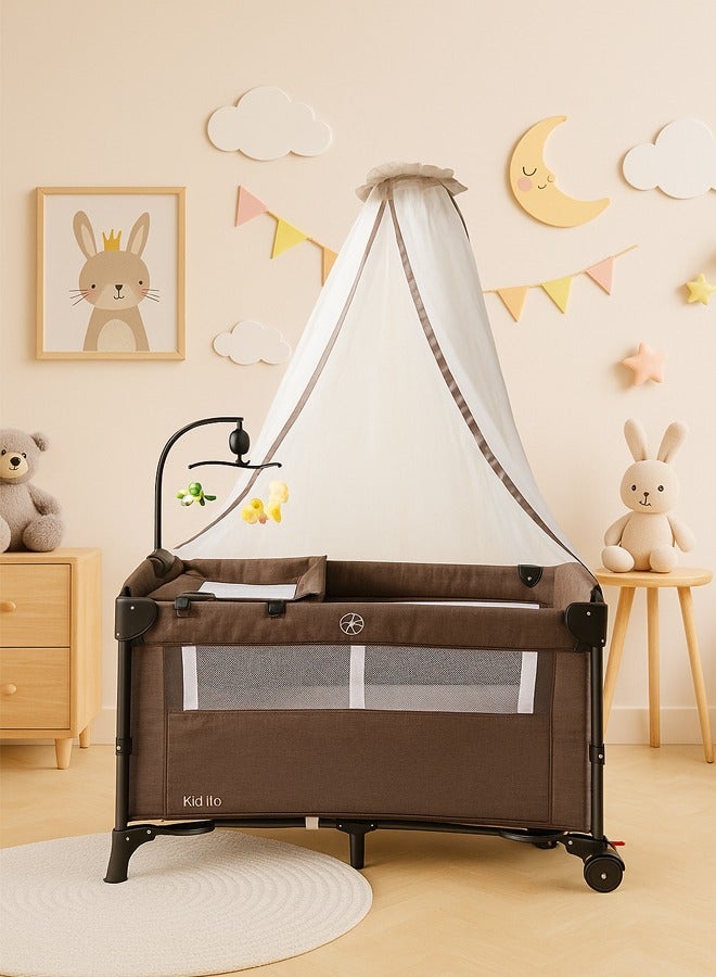 كيديليو سرير أطفال عريض 4 في 1 بجانب السرير مع مبدل حفاضات، سرير طويل بجوار السرير مع مرتبة وملاءة وموسيقى وغطاء تعتيم، بني - Image 1