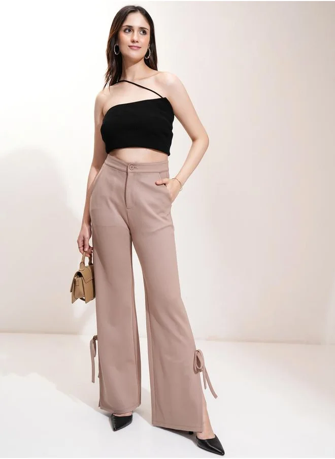 Tokyo Talkies Mid Rise Flared Trousers with Bow Tie Detail