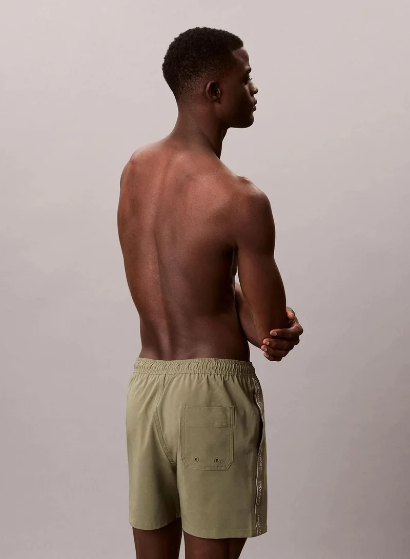 Calvin Klein Deep Lichen Green Core Solid Swim Shorts for Men | Best Price UAE