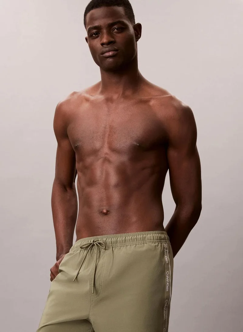 Calvin Klein Deep Lichen Green Core Solid Swim Shorts for Men | Best Price UAE