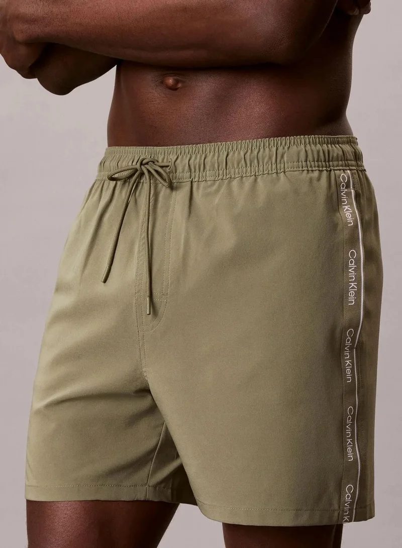 Calvin Klein Deep Lichen Green Core Solid Swim Shorts for Men | Best Price UAE