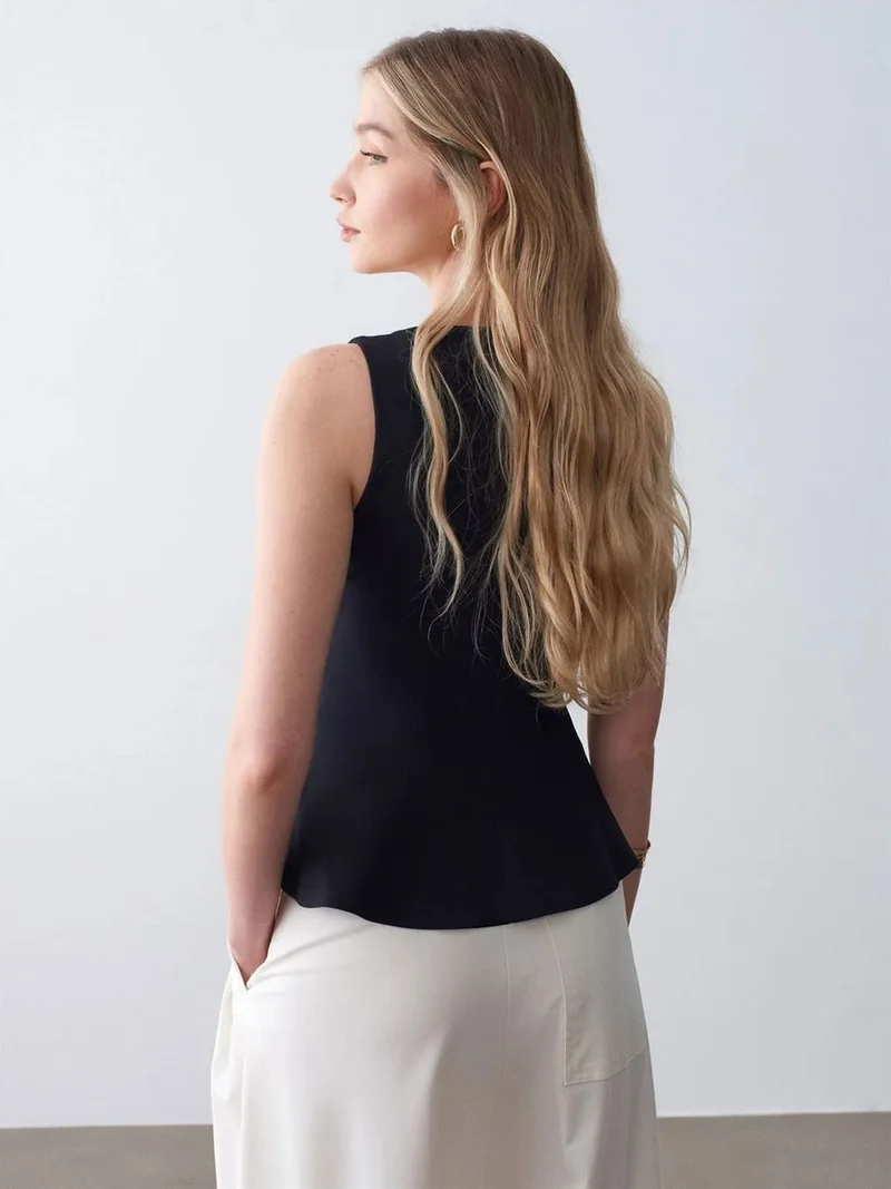 ديلفين Dilvin Fitted Sleeveless Crepe Peplum Blouse