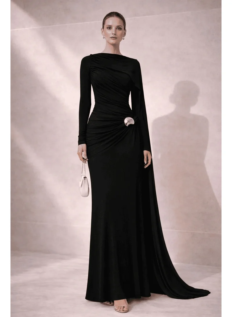 2Trendy Women's Black Evening Gown with Metallic Waist Clasp and Cape Detail