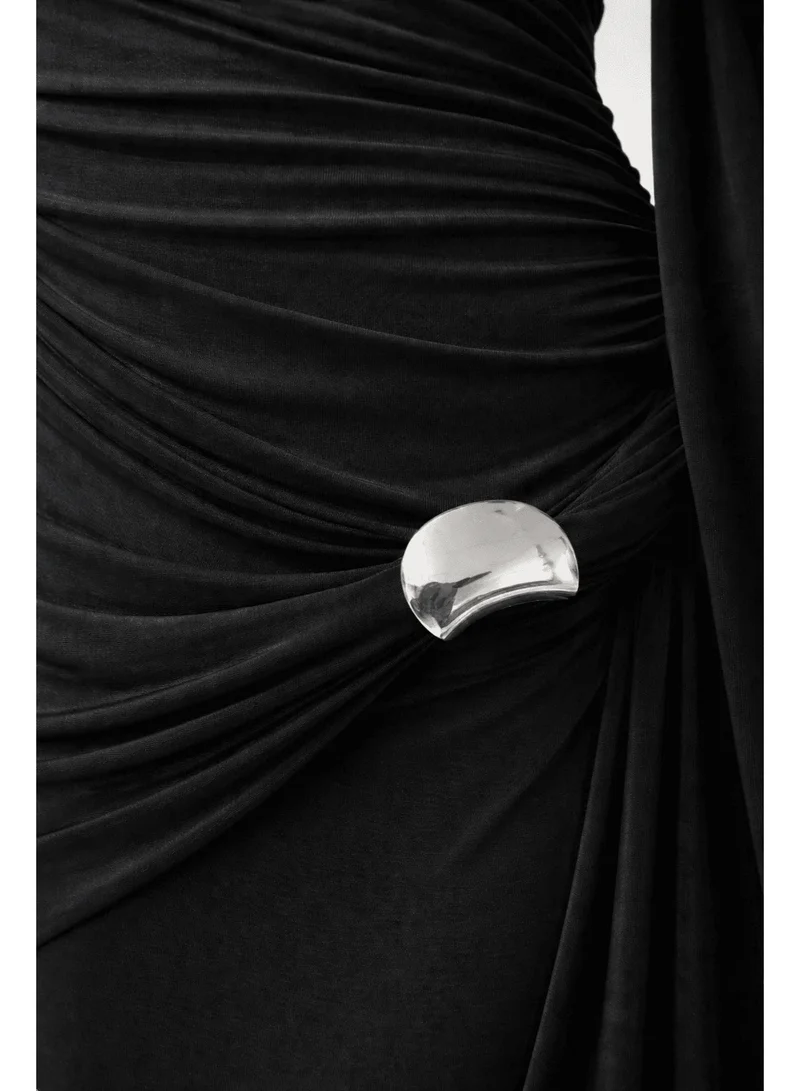 2Trendy Women's Black Evening Gown with Metallic Waist Clasp and Cape Detail