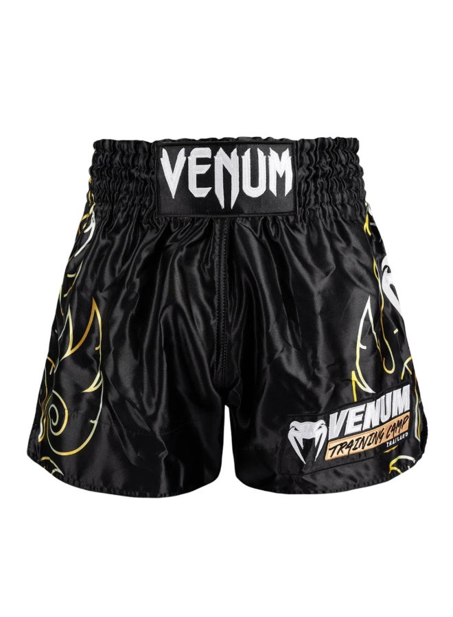 VENUM VTC FLAMES MUAY THAI SHORTS BLACK/GOLD - Image 1