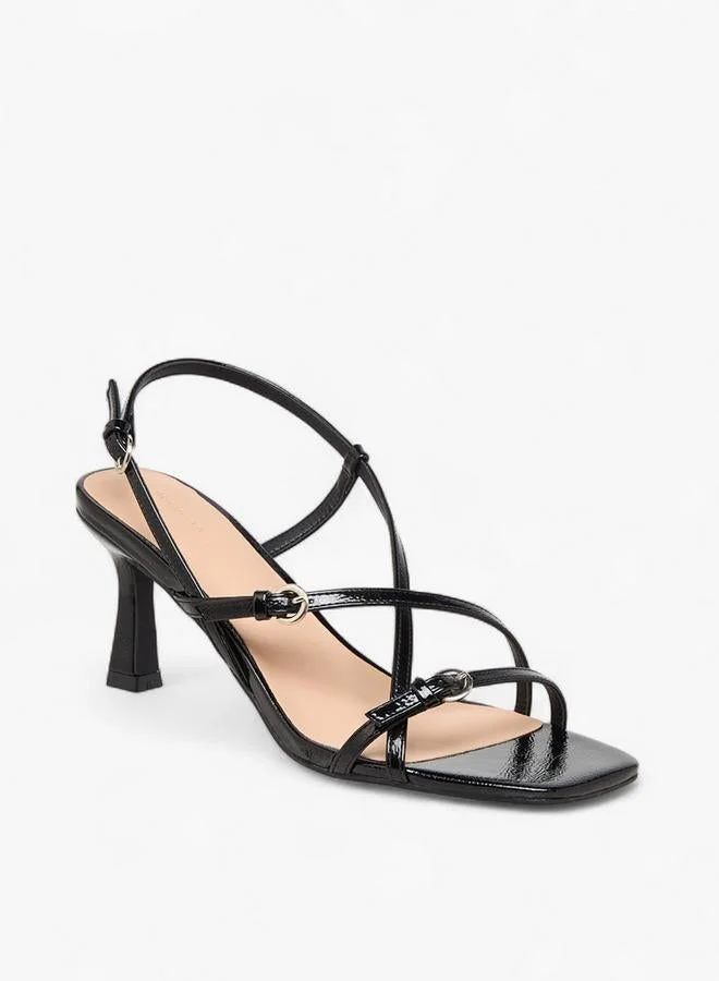 فلورا بيلا من شو إكسبرس صنادل بكعب عريض بحزام متقاطع للنساء