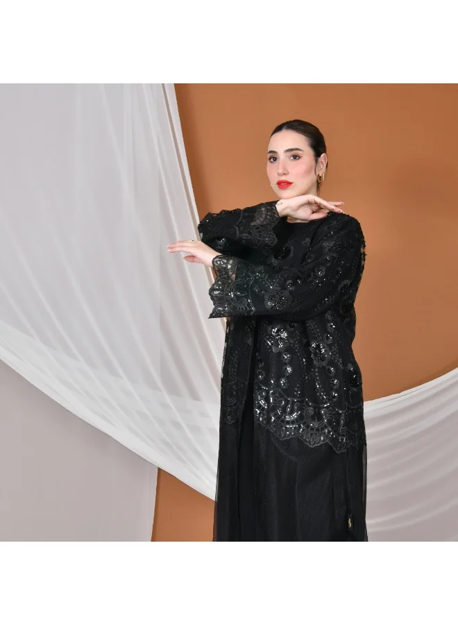 HAWRAA ABAYA Elegant tulle abaya decorated with embroidery with a black dress