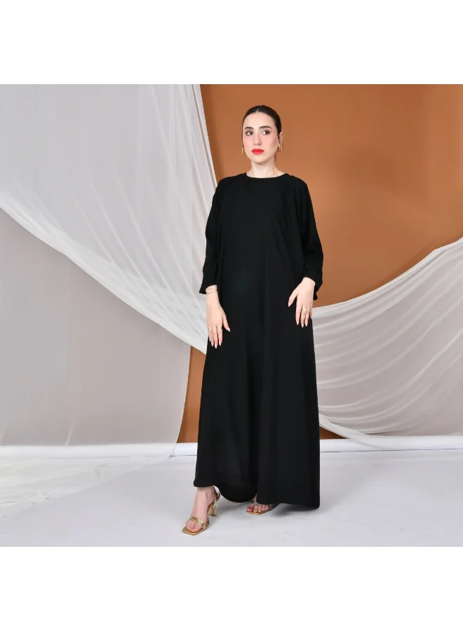 HAWRAA ABAYA Elegant tulle abaya decorated with embroidery with a black dress