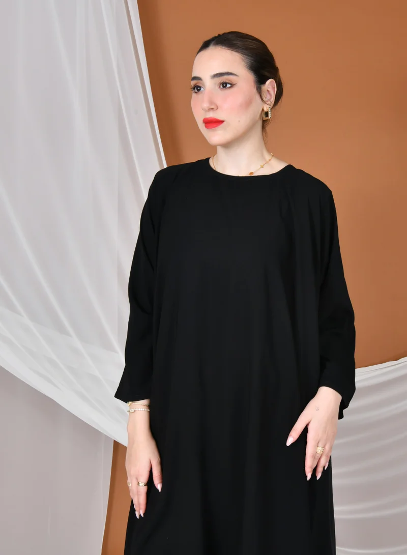 HAWRAA ABAYA Elegant tulle abaya decorated with embroidery with a black dress
