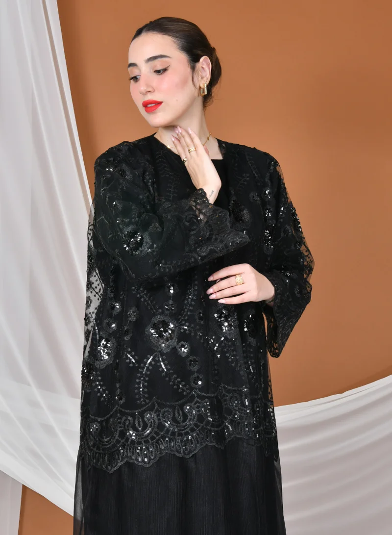 HAWRAA ABAYA Elegant tulle abaya decorated with embroidery with a black dress