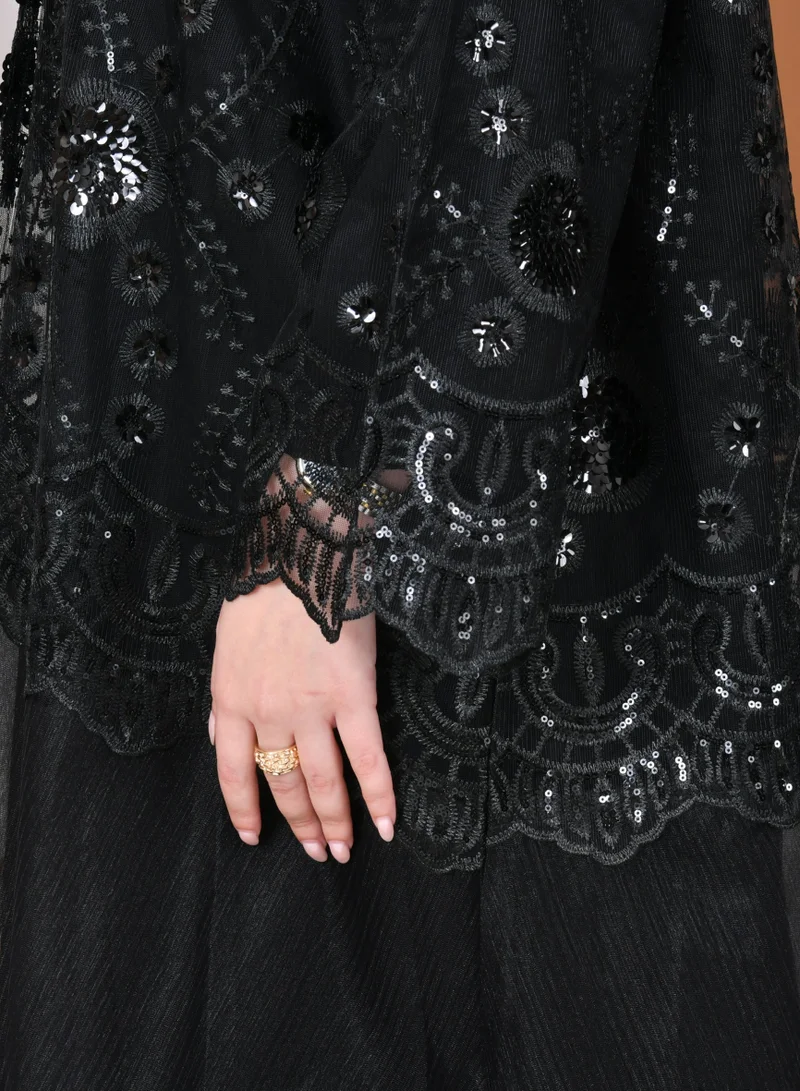 HAWRAA ABAYA Elegant tulle abaya decorated with embroidery with a black dress