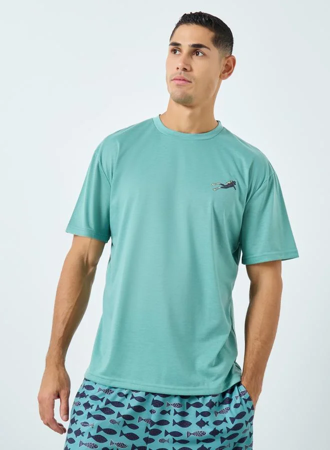 Styli Styli Men Teal Solid T-Shirt and Fish Print Shorts Pyjama Set