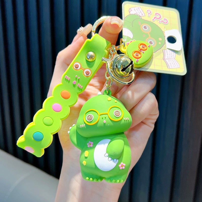 Genuine cute dinosaur key chain cute bag pendant soft rubber car key chain doll machine small gift wholesale Green-soft plastic doono dinosaur