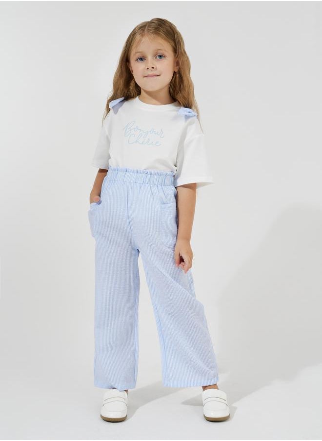 Styli Slogan Print Oversized T-Shirt & Striped Pants Set  - Image 1