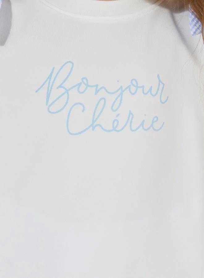 Styli Slogan Print Oversized T-Shirt & Striped Pants Set