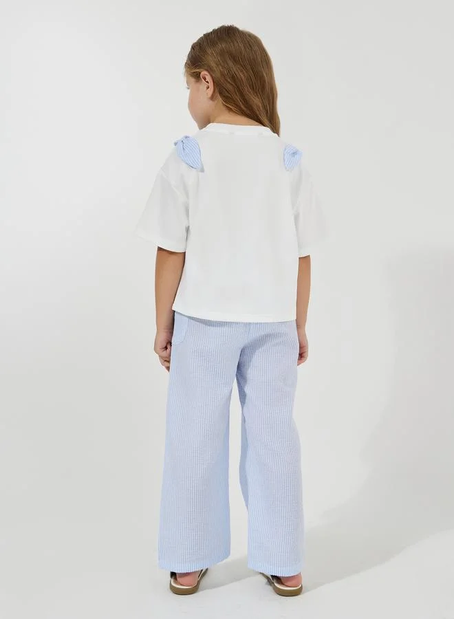 Styli Slogan Print Oversized T-Shirt & Striped Pants Set
